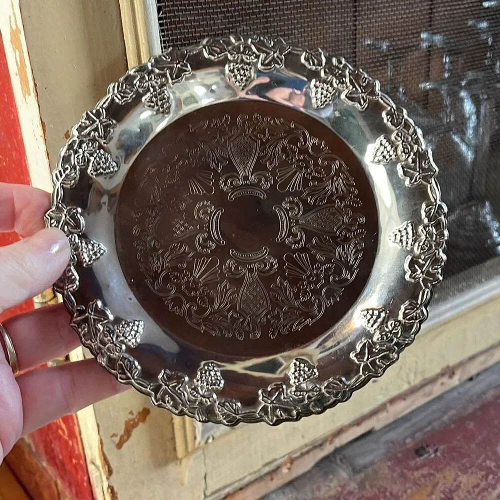 VTG Hong Kong etched grape leaves wine bottle coaster.